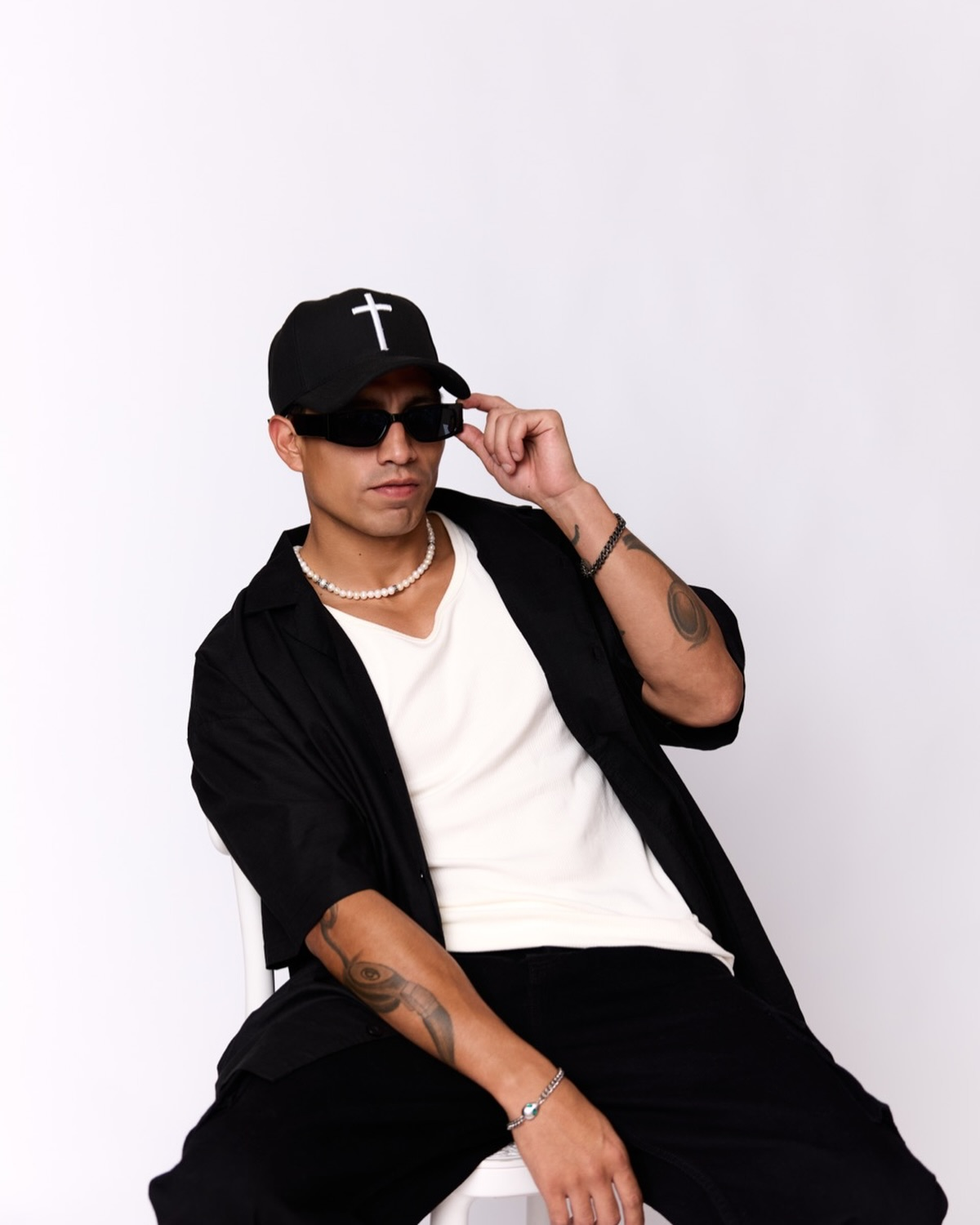 DJ Andrews portrait with neon rim lighting